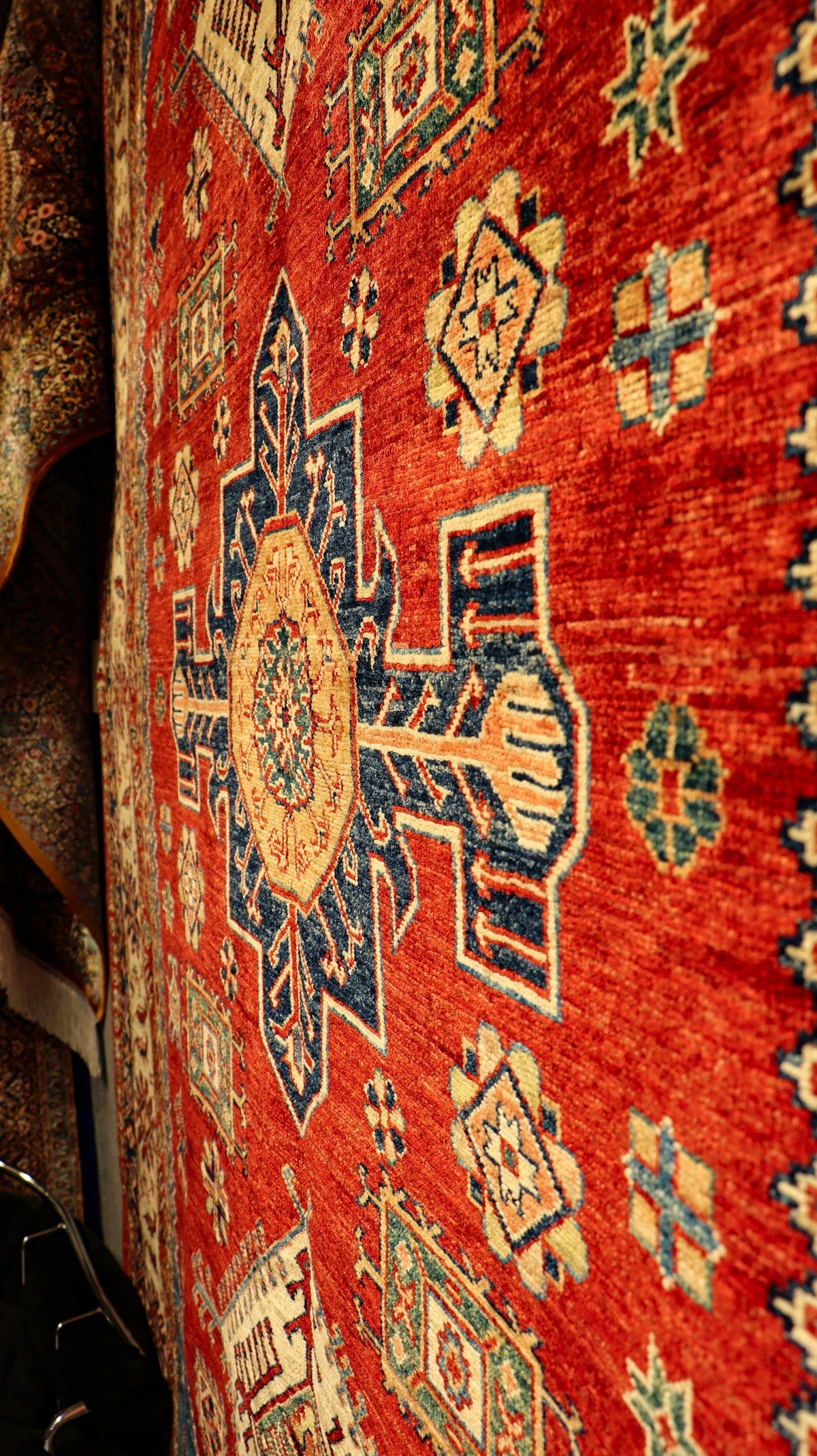 a close up of a rug on a wall