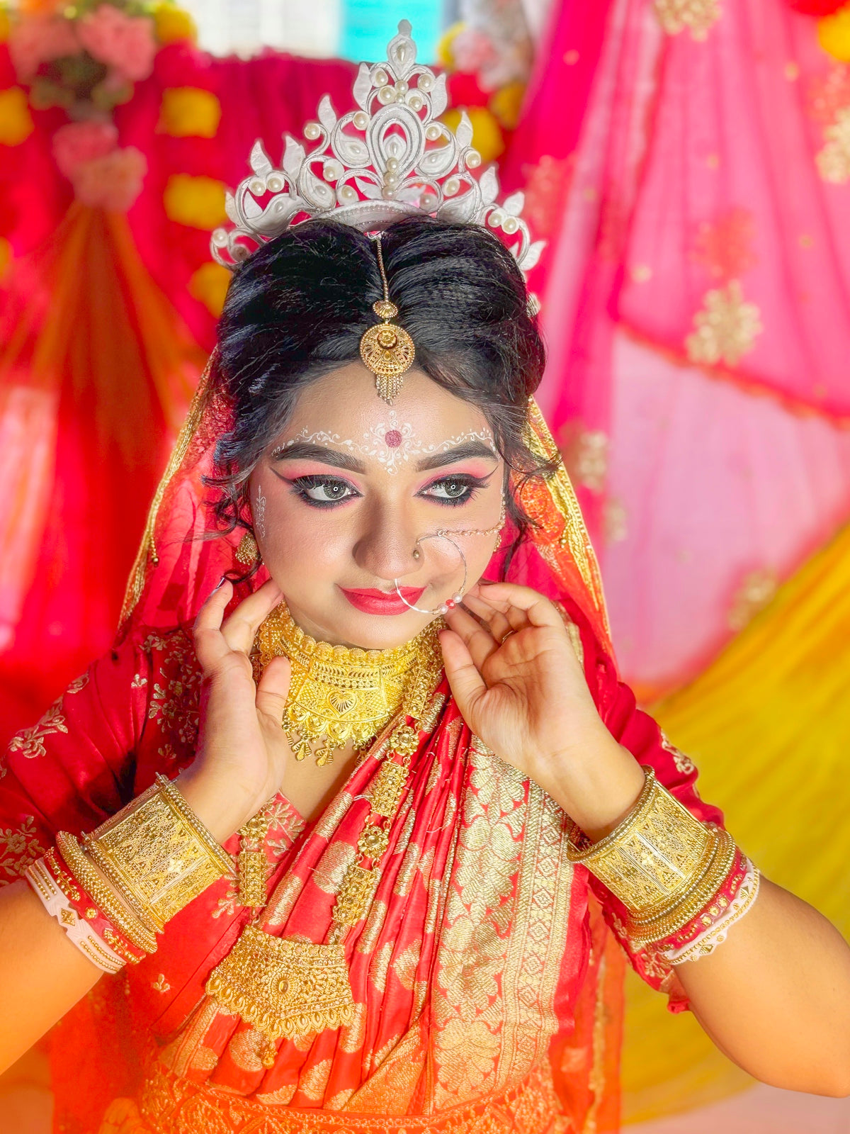 A beautiful indian bride in traditional attire.