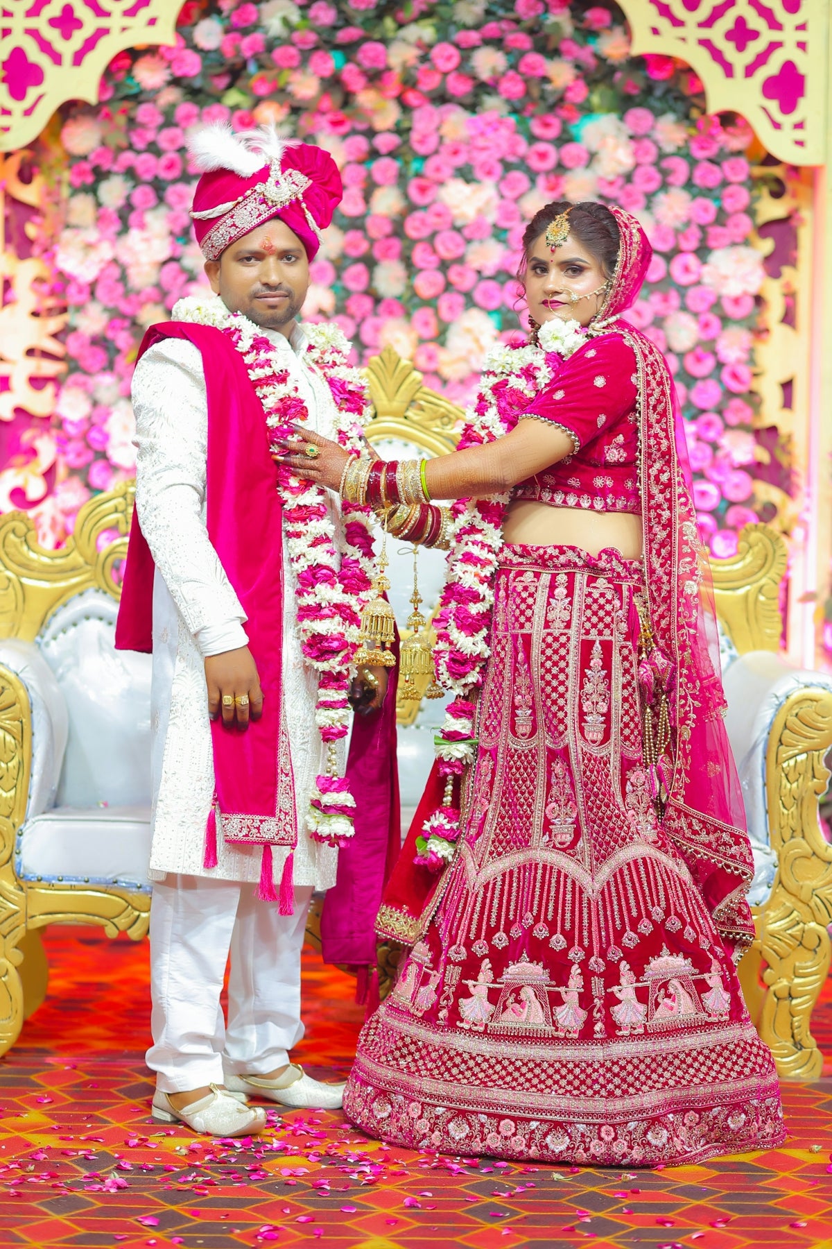Bride and groom in traditional indian wedding attire